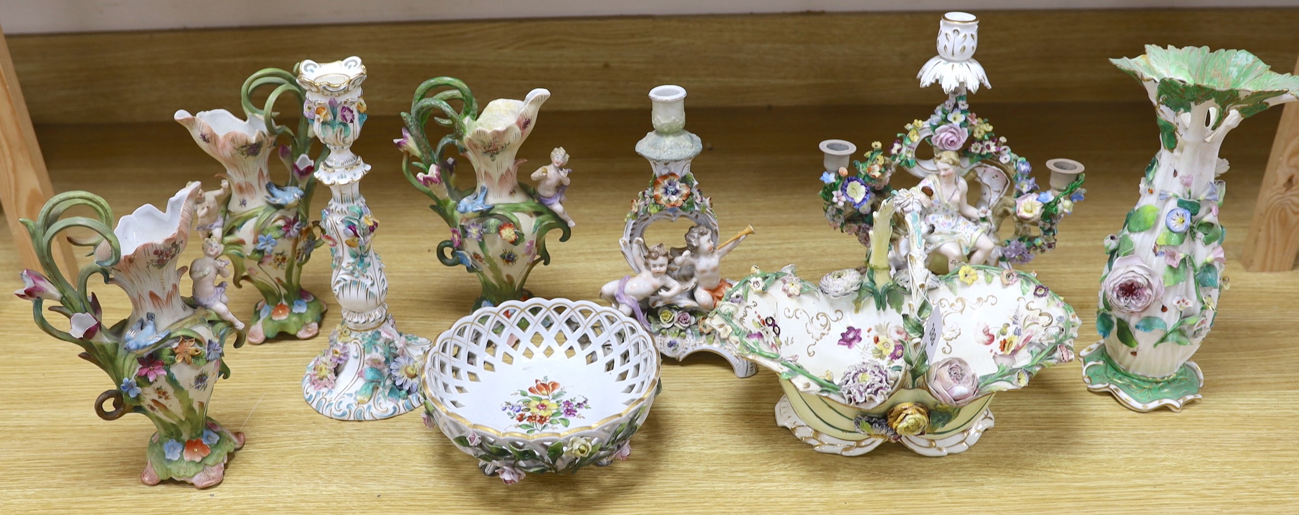 A group of 19th century and later continental floral encrusted porcelain items